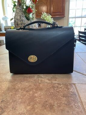Classic Black Leather Top-Handle Bag with Gold Turn-Lock